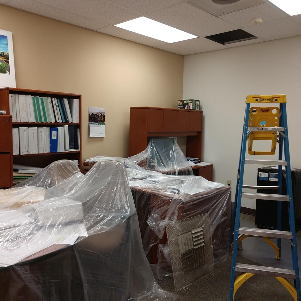 Commercial Setup Plastic Coverings Over Furniture